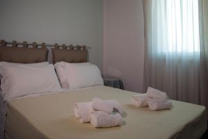 Postel nebo postele na pokoji v ubytování La Residenza del Golfo