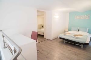 Posteľ alebo postele v izbe v ubytovaní Great Trees Apartment