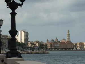 a view of a city with a river and buildings at 1910 B&B in Bari