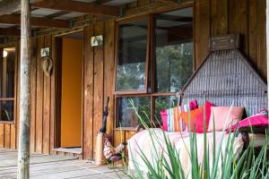 a porch with a hammock on a house at Country Lane Lysterfield in Rowville