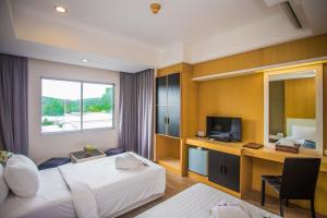 Foto da galeria de New Travel Lodge Hotel em Chanthaburi