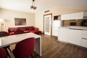 Kuchyň nebo kuchyňský kout v ubytování Maxuite Hotel in Home