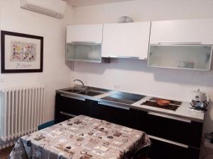 Kuchyň nebo kuchyňský kout v ubytování Rocchi Residence