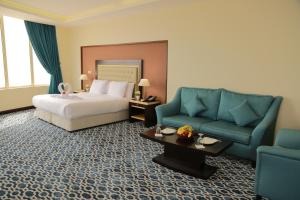 Ένα ή περισσότερα κρεβάτια σε δωμάτιο στο Beach Inn +50 φωτογραφίες