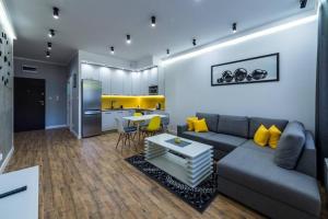 Posedenie v ubytovaní Apartament Żeglarska Loft U4