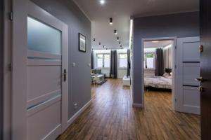 Posteľ alebo postele v izbe v ubytovaní Apartament Żeglarska Loft U4