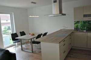 Kuchyň nebo kuchyňský kout v ubytování Boardinghouse-Niedernberg