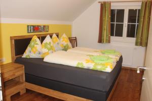 Llit o llits en una habitació de Appartment Stroblhof