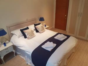 A bed or beds in a room at Alne Park 