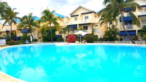 La alberca dentro o cerca de Villa in Le Tamier, 4 bedrooms, 300m Flic en Flac beach