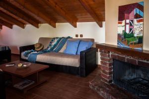 Ein Sitzbereich in der Unterkunft Nostos Apartments
