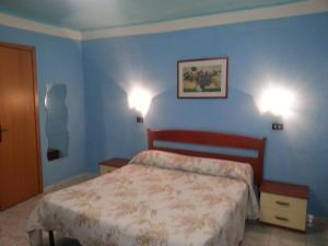 Postel nebo postele na pokoji v ubytování Roxena house