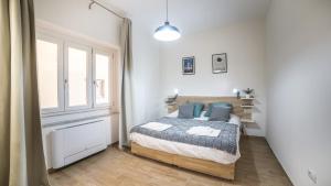 Ένα ή περισσότερα κρεβάτια σε δωμάτιο στο Cramu Bed&Breakfast