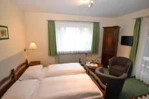 Postel nebo postele na pokoji v ubytování Hotel Central