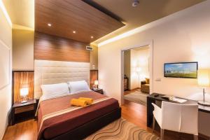 Ένα ή περισσότερα κρεβάτια σε δωμάτιο στο Hotel San Marco +59 φωτογραφίες