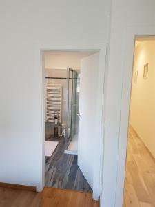 a hallway with a door leading to a bathroom at Villa Kaliope in Brgulje +46 photos