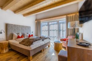 TV a/nebo společenská místnost v ubytování Hotel Stoeres - Active wellbeing