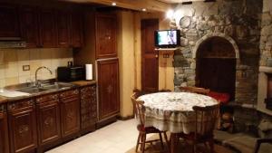 Kuchyň nebo kuchyňský kout v ubytování Taverna Semon