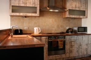 Kuchnia lub aneks kuchenny w obiekcie Apartament Sandomierskie Wzgórze