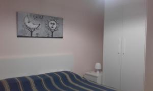 A bed or beds in a room at B&B la Palma