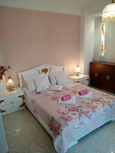 A bed or beds in a room at Prime Luxury Villa beach front