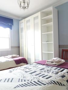 Posteľ alebo postele v izbe v ubytovaní Apartamento Belén
