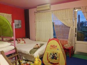 Postel nebo postele na pokoji v ubytování 101 Homestay