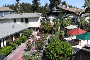an aerial view of a house with a garden at The Woods Hotel - Gay LGBTQ Cabins in Guerneville
