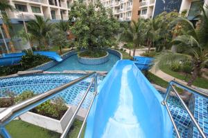 Bazén v ubytování Laguna Beach Resort 2 by Pattaya Sunny Rentals nebo v jeho okolí