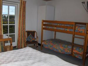 Tempat tidur susun dalam kamar di Motel Majbølle Gamle Skole