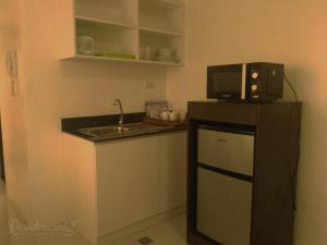 Virtuvė arba virtuvėlė apgyvendinimo įstaigoje Residenciale Boutique Apartments
