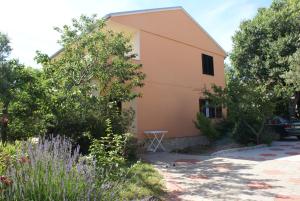 Vonkajšia záhrada v ubytovaní Apartment Ana M