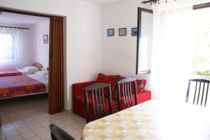 Postel nebo postele na pokoji v ubytování Apartment Ana M