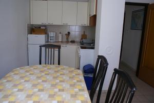 Kuchyň nebo kuchyňský kout v ubytování Apartment Ana M