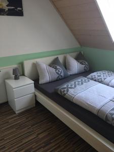 Postel nebo postele na pokoji v ubytování Ferienwohnung Held