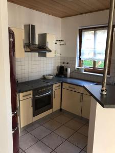 Kuchyň nebo kuchyňský kout v ubytování Ferienwohnung Held