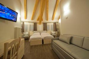 Voodi või voodid majutusasutuse Hotel Niagara toas