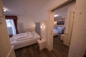 Voodi või voodid majutusasutuse Hotel Niagara toas