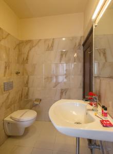Koupelna v ubytování Hotel Shalimar