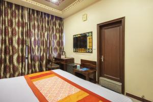 Postel nebo postele na pokoji v ubytování Hotel Shalimar