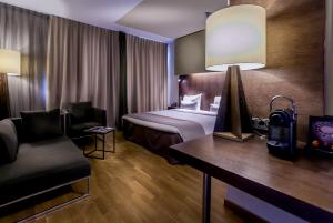 Ein Bett oder Betten in einem Zimmer der Unterkunft Hotel Artemis Amsterdam