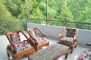 A balcony or terrace at Sritanjung Homestay