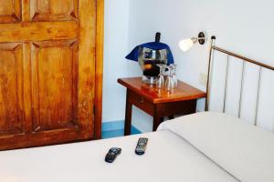 Кровать или кровати в номере Hotel Rizieri