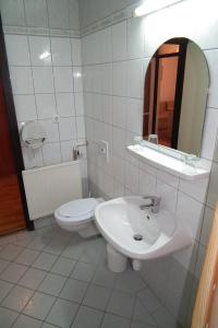 Koupelna v ubytování Hotel Napsugar
