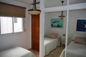 Postel nebo postele na pokoji v ubytování Duplex Esperanza