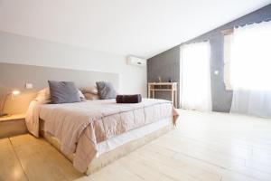 Postel nebo postele na pokoji v ubytování Apres La Sieste