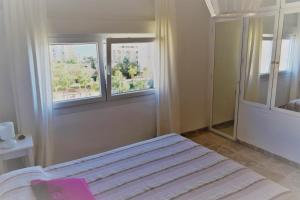 Postel nebo postele na pokoji v ubytování Duplex Esperanza
