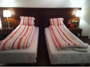 A bed or beds in a room at Apartament Pod Tatrami Stara Polana