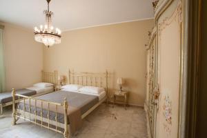 Een bed of bedden in een kamer bij Settimo Cielo
