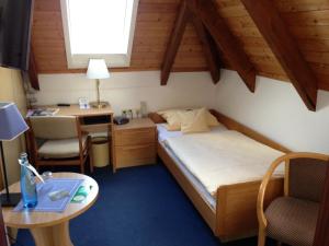 Ein Bett oder Betten in einem Zimmer der Unterkunft Atlantic Hotel Garni